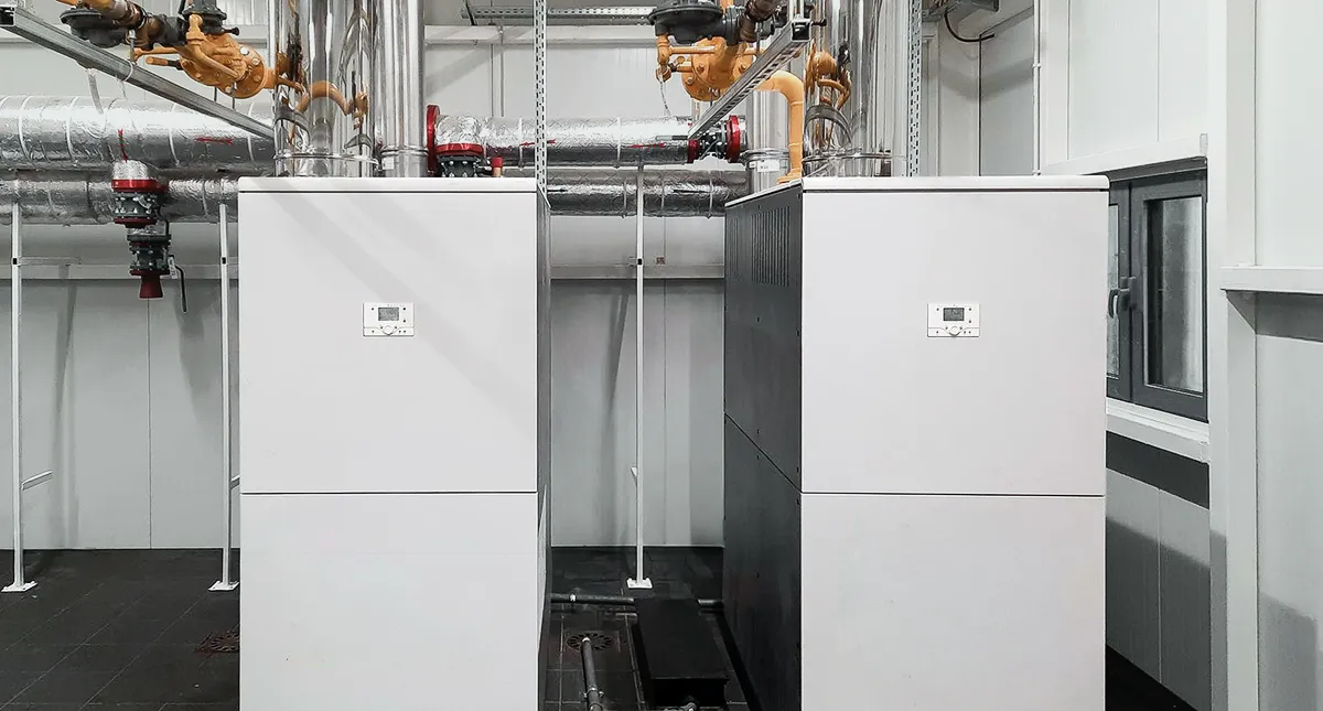 <ul class="full-list-box text-area-66"><li><p class="title">Hybridos System</p>
<p></p>
<p>Combining condensing boiler and heat pump technologies for seamless hybrid performance.</p></li><li><p class="title">Retrofit projects</p>
<p></p>
<p>Integrating renewables into existing heating systems to extend lifespan and boost efficiency.</p></li><li><p class="title">Tailored solutions</p>
<p></p>
<p>Designed for commercial and industrial facilities where flexibility and reliability are key.</p></li></ul>